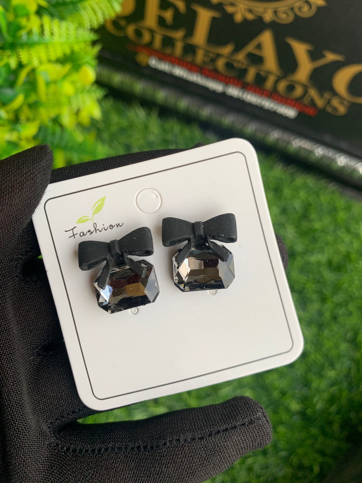 Black bow tie stoned earrings