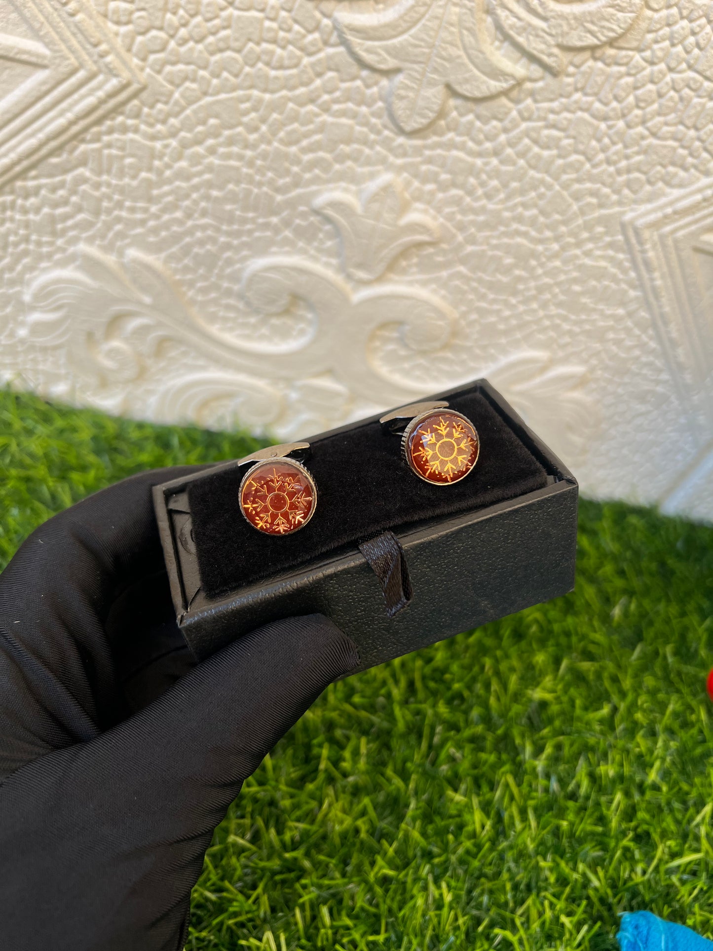 Brown gold cufflinks