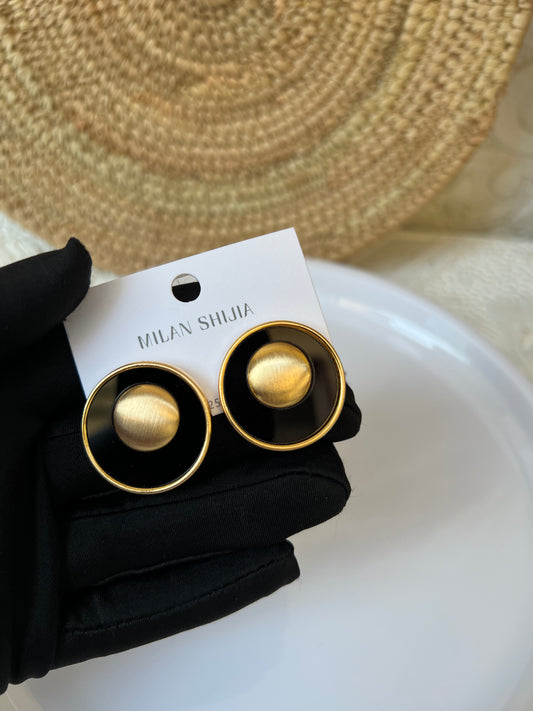 Gold and black earrings