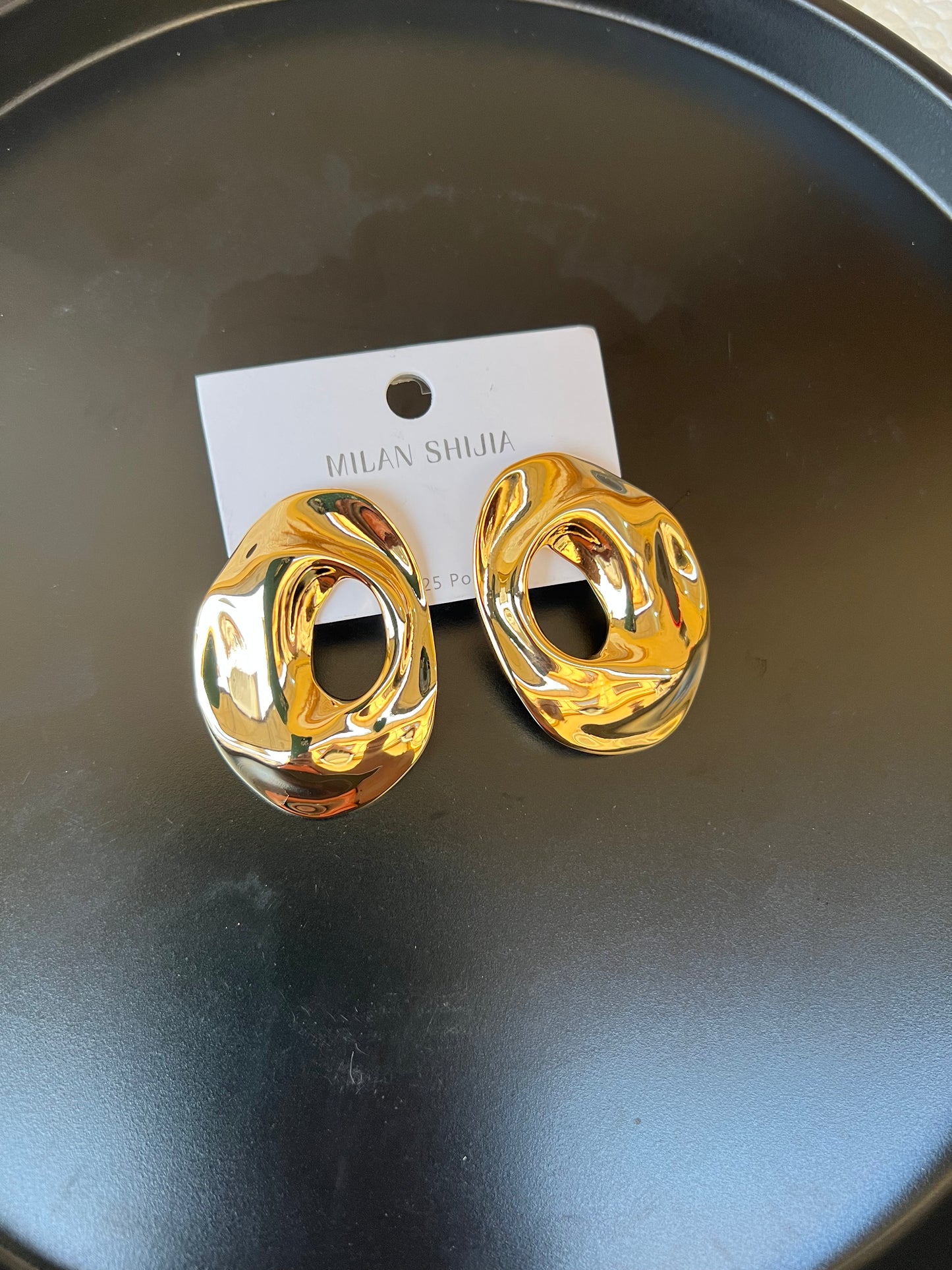 Gold statement earrings