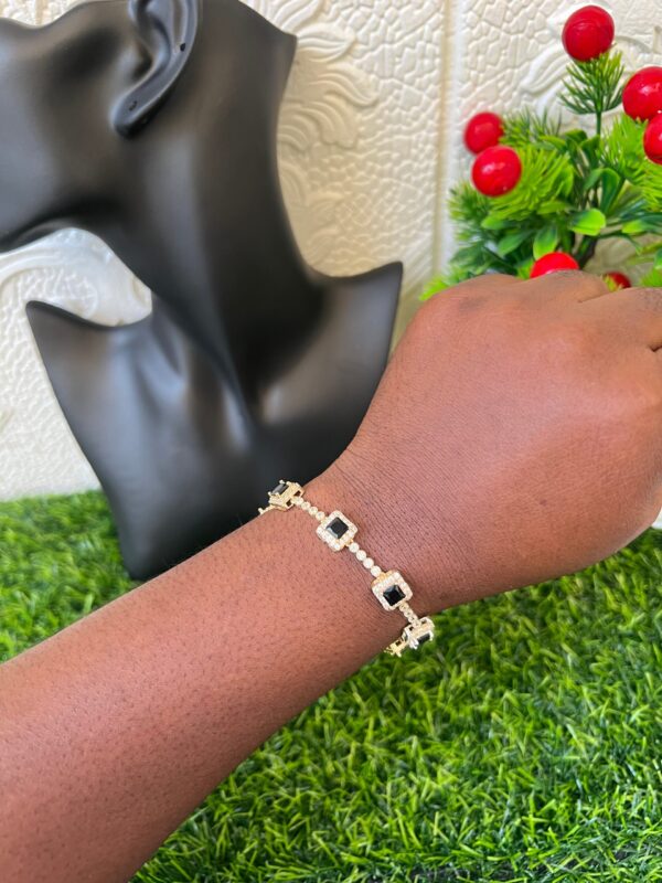 Gold and black bracelet