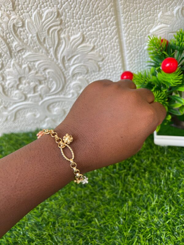 Gold bracelets with droppings