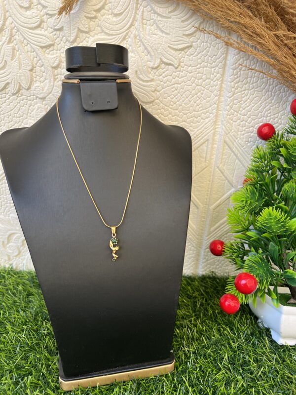 Emerald/gold necklace