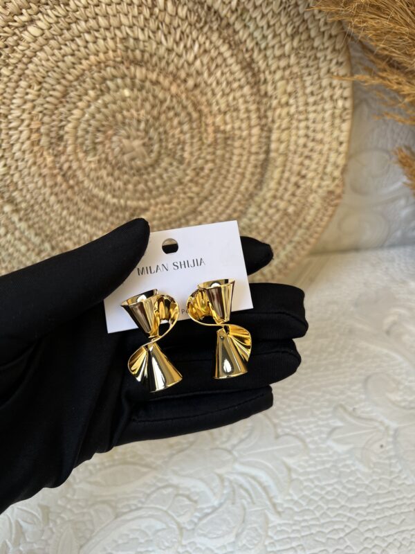 Isoken gold steel earrings
