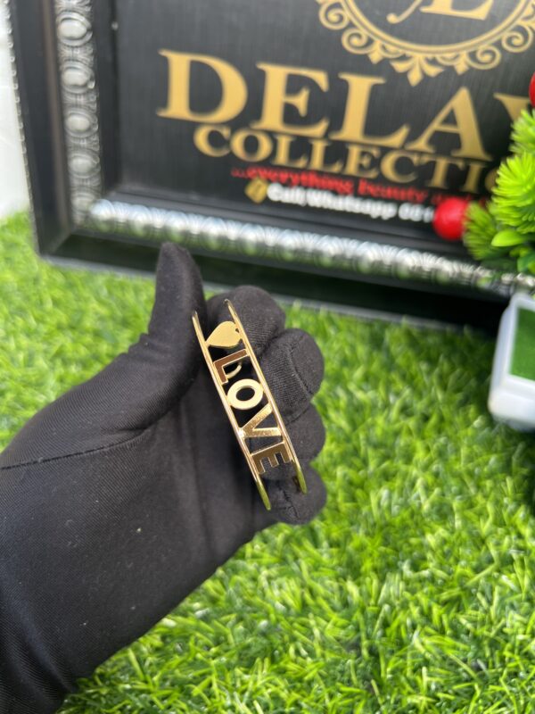 Gold love bangle