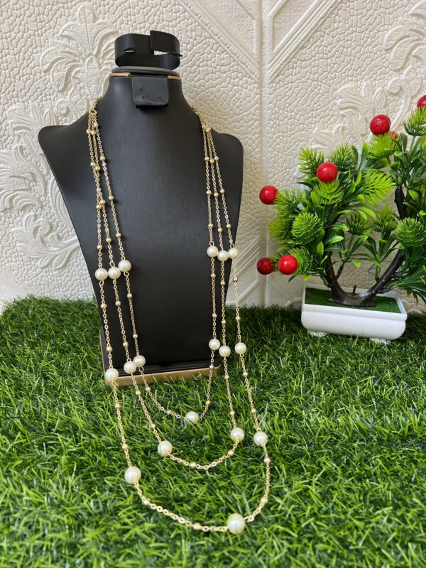 Layered long pearl necklace
