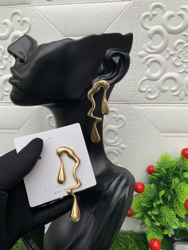 Bone gold earrings