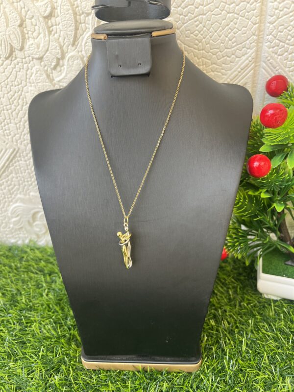 Gold and silver pendant in one necklace
