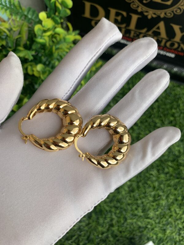 Gold steel patterned earrings