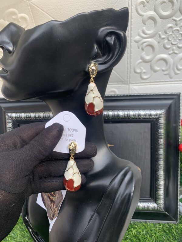 Wine and offwhite statement earrings