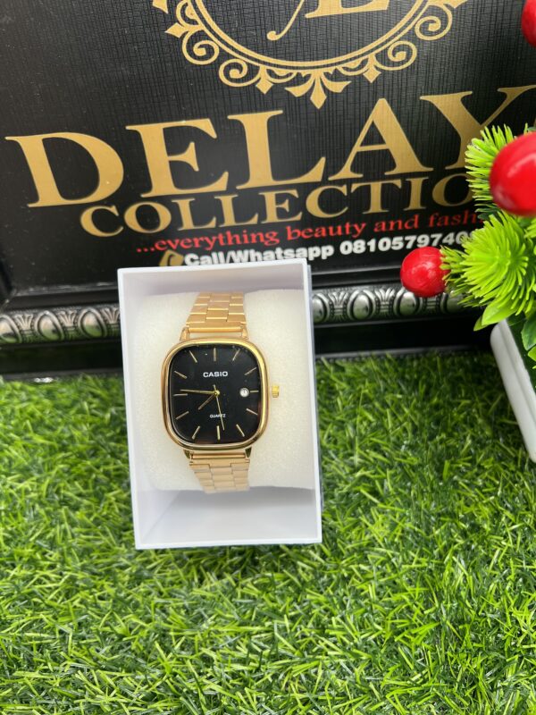 Gold/black male wristwatch