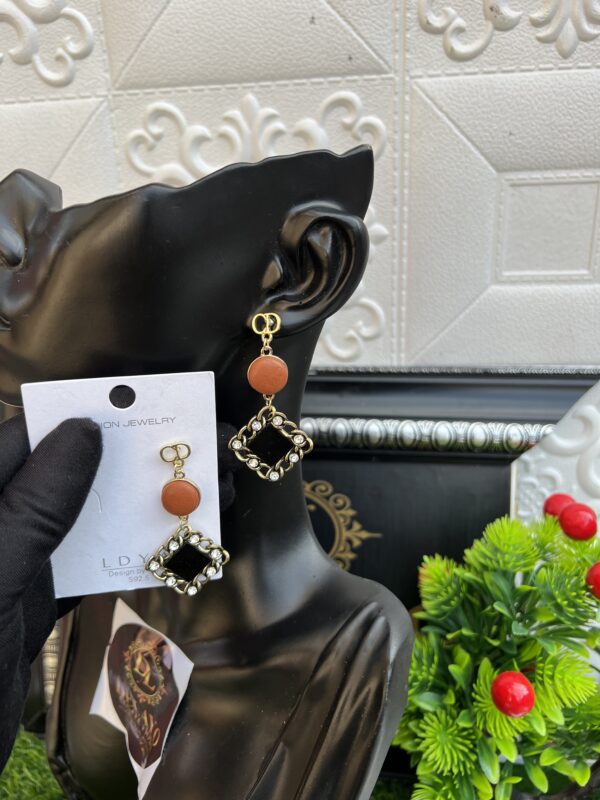 Black/orange earrings