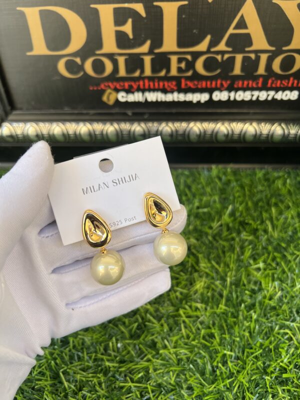Gold and pearl steel earrings