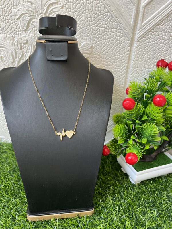 Gold love/heart wave stoned necklace