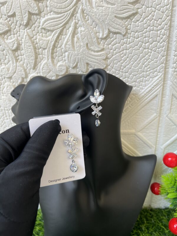 Silver stoned dropping earrings