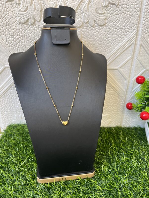 Gold love/candy necklace