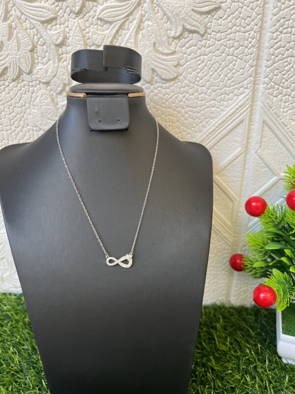 Silver stoned infinity necklace