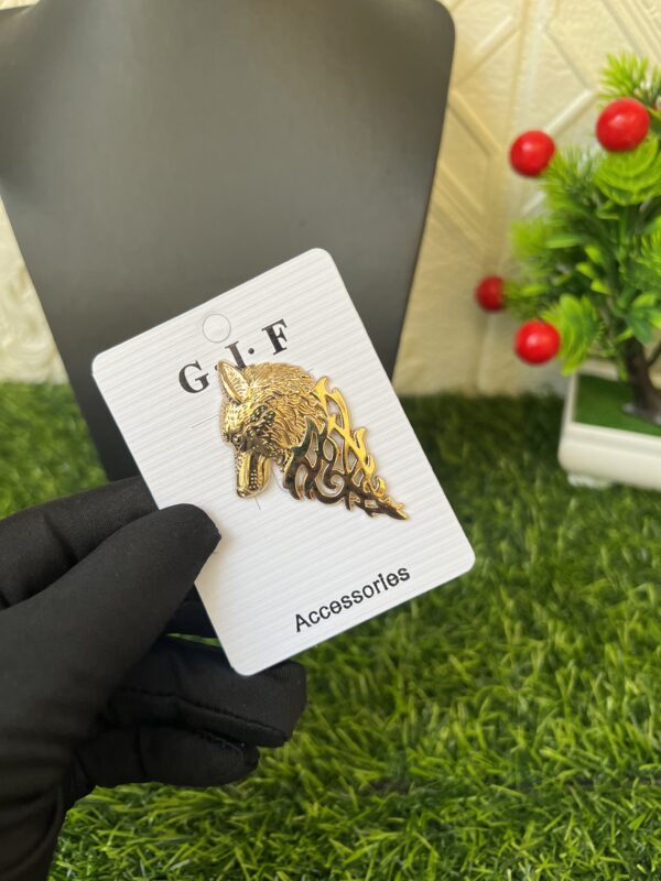 Gold lapel pin