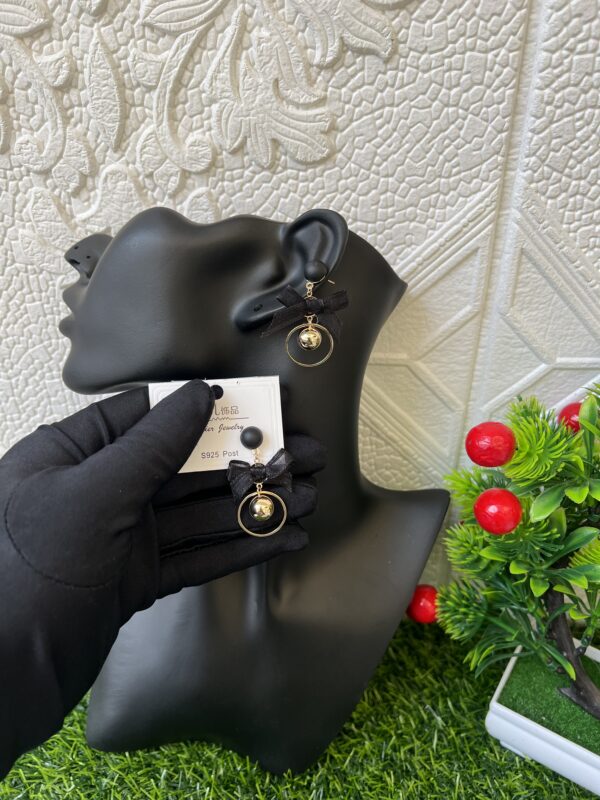 Black bow tie earrings