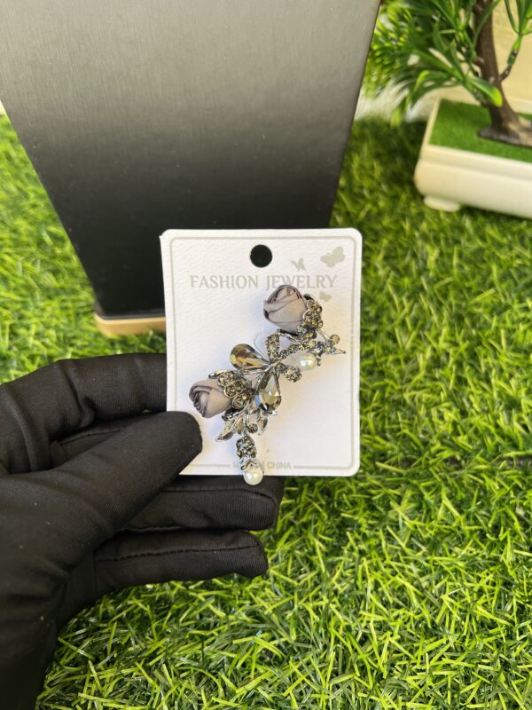 Grey rose brooch
