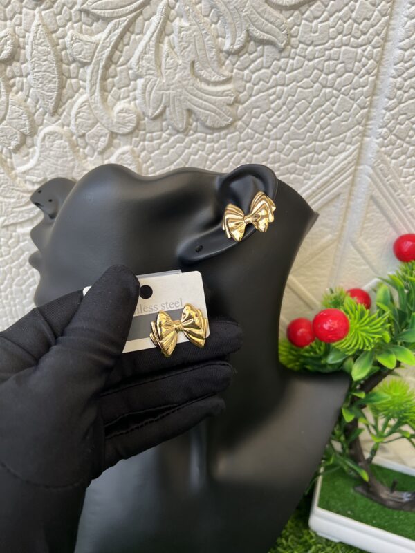 Bow gold earrings