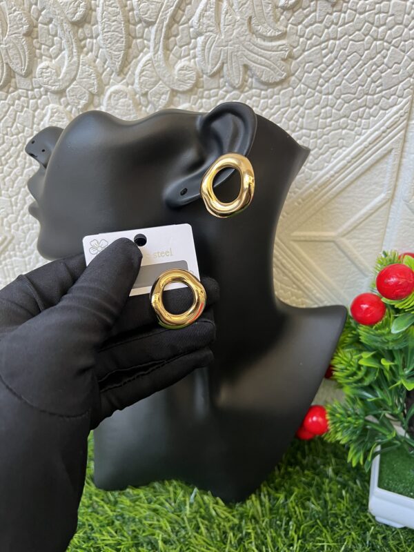 Oval gold steel earrings