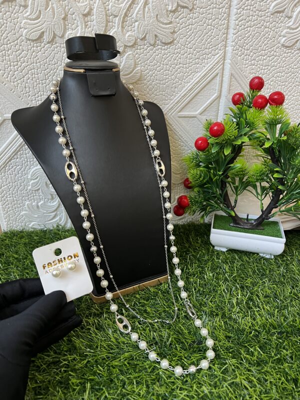 Long silver pearl necklace with stud