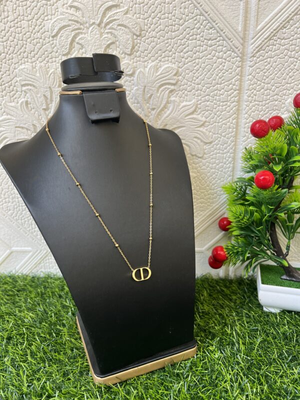 CD gold candy necklace
