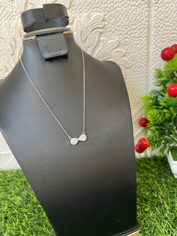 Silver stoned infinity necklace