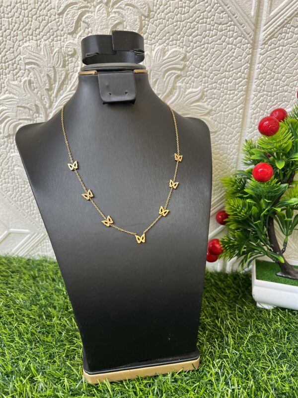 Butterfly gold charm necklace