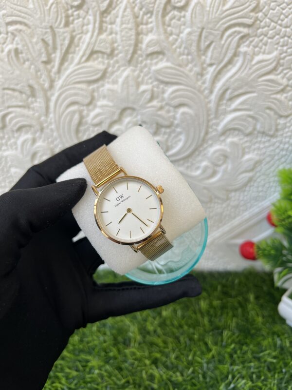 DW female gold wristwatch