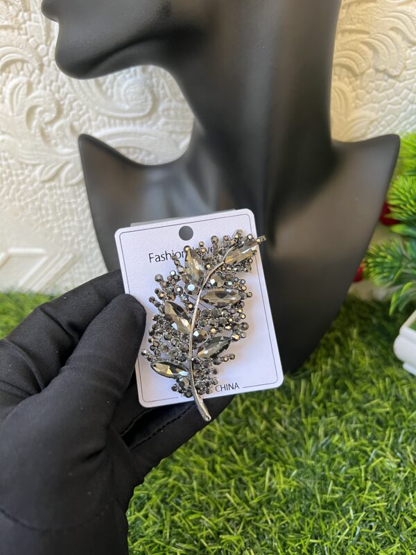 Grey stoned leaf brooch