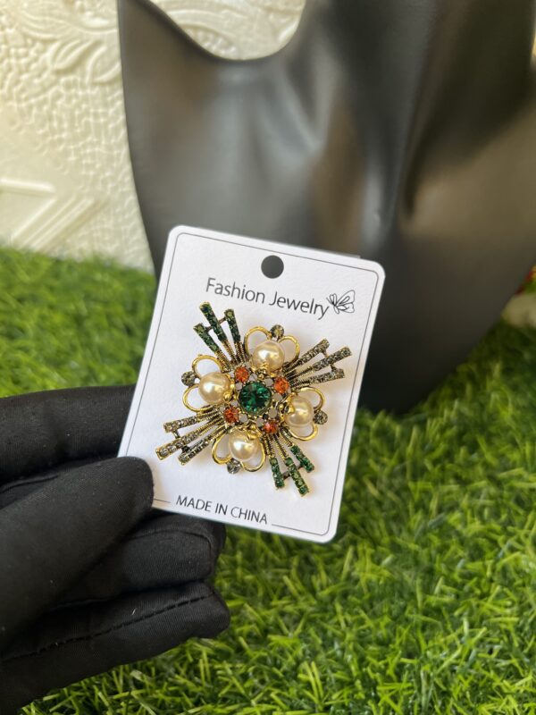 Precious brooch