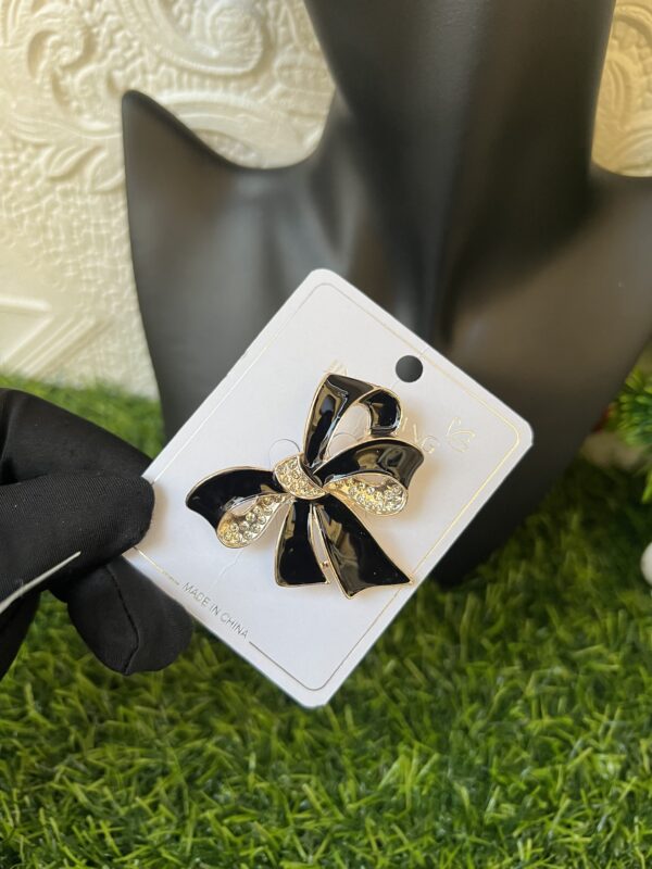 Black bow tie brooch