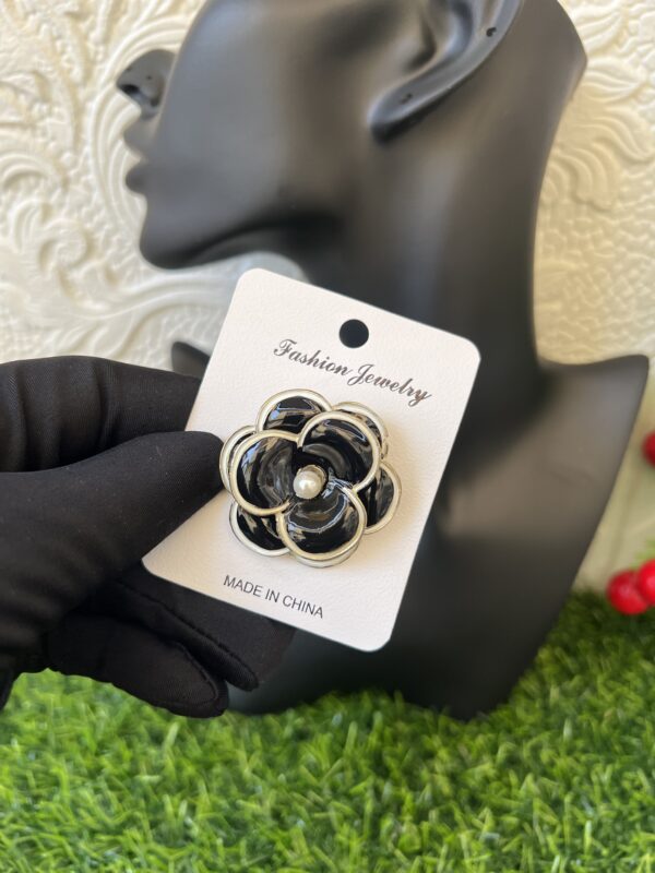 Black brooch