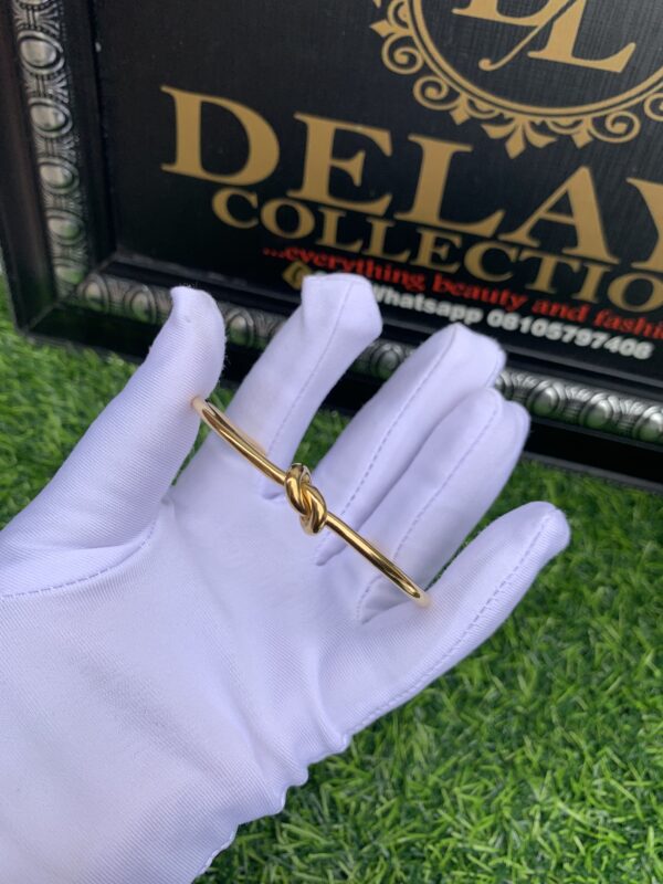 Gold infinity bangle
