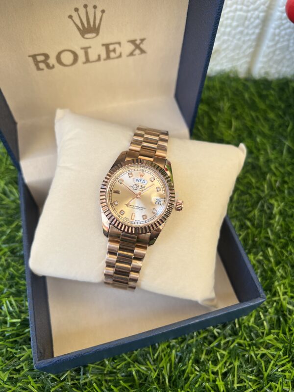 Rose gold female wristwatch