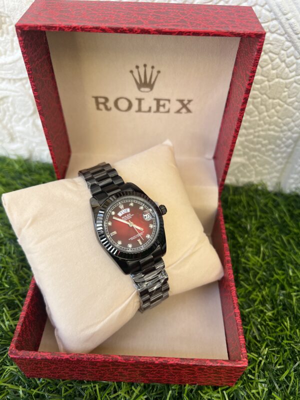 Black and red face Rolex wristwatch