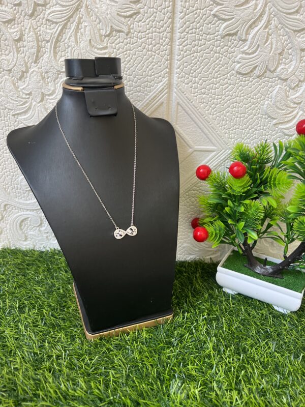 Silver stoned infinity necklace