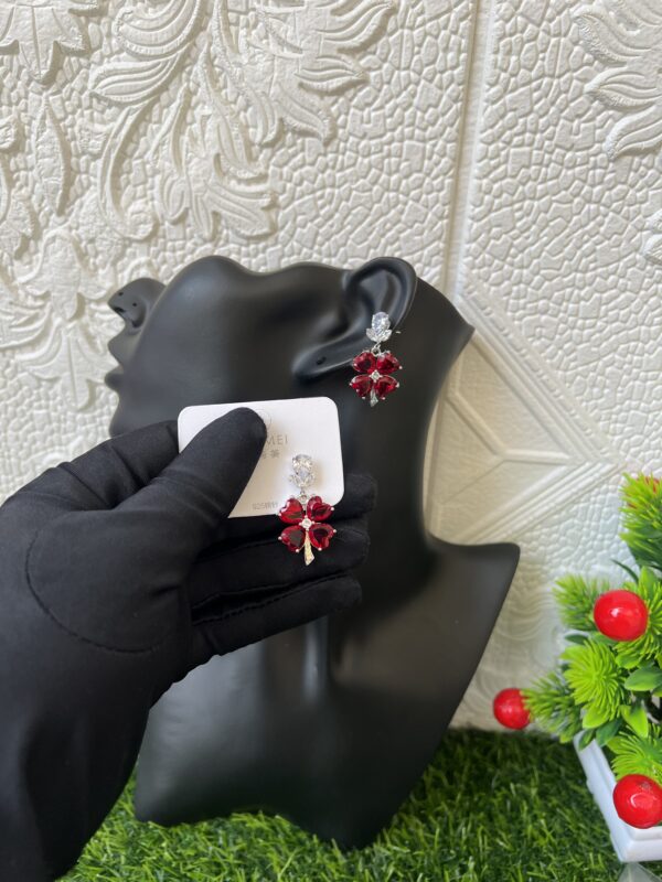 Silver/red stoned earrings