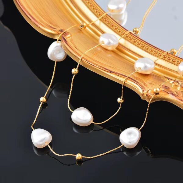 Jane Pearl/ gold layered necklace