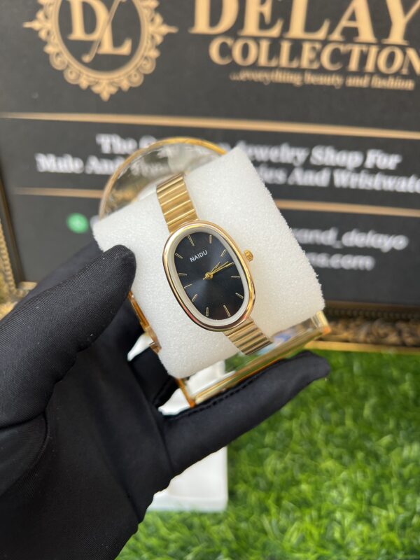 Sleek gold and black wristwatch