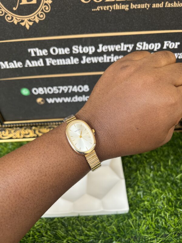 Sleek gold and white wristwatch
