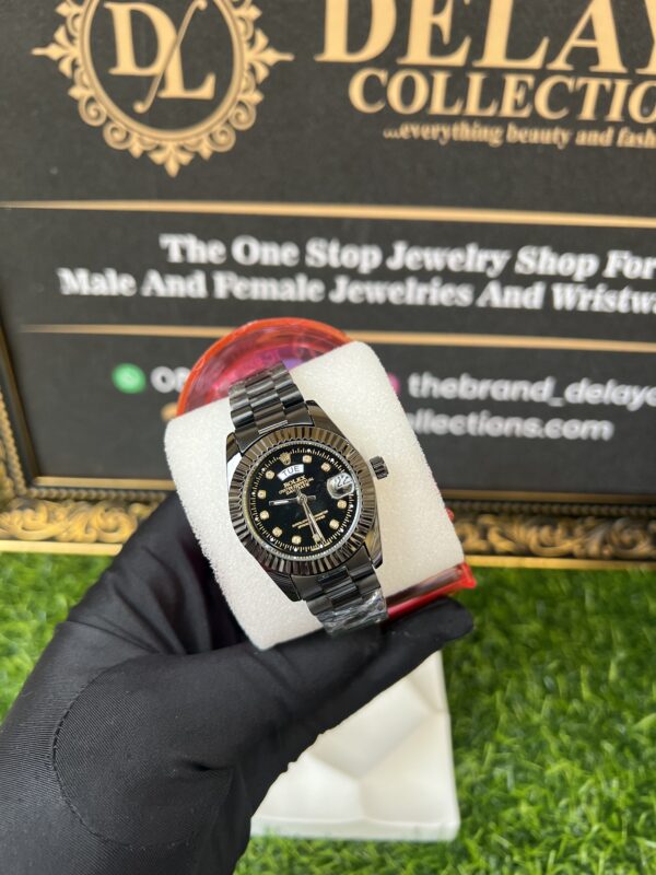 Black Rolex female wristwatch