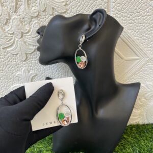 Silver colored dropping earrings