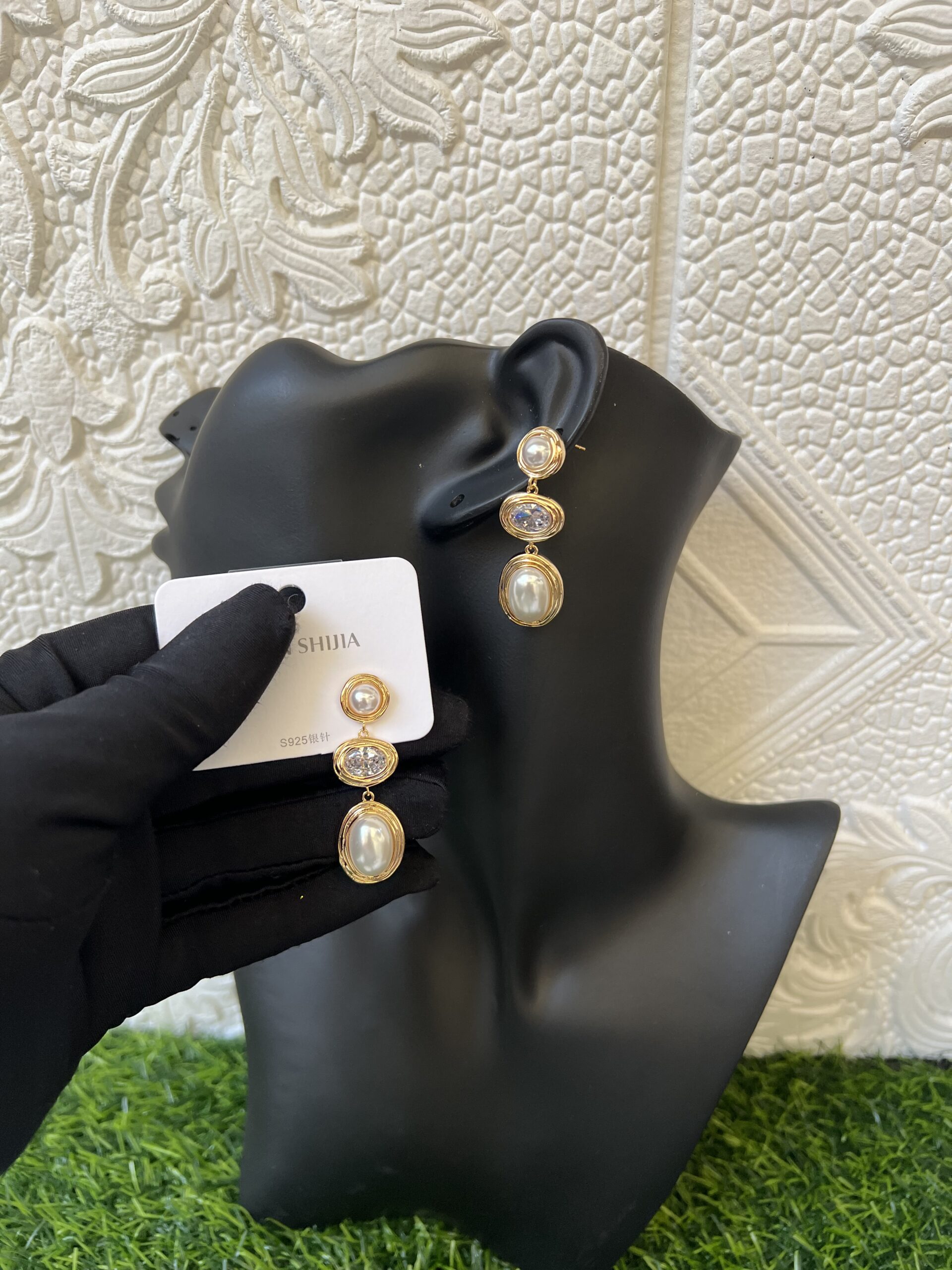 Gold pearl dropping earrings