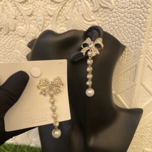 Bow tie dropping stoned earrings