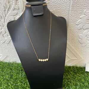 gold/stoned necklace