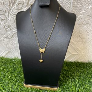 bow-tie / love dropping gold necklace