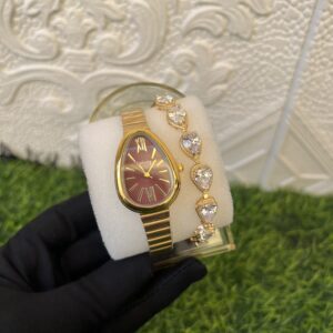 gogory red face gold watch and bracelet